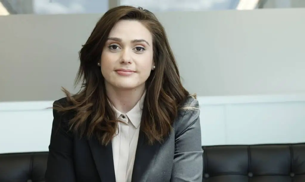 What is the likelihood of Gen Z women to own a home?